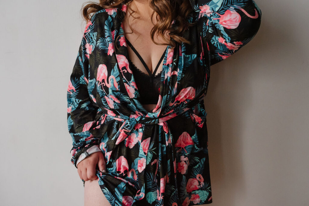 woman wearing pink flamingo robe