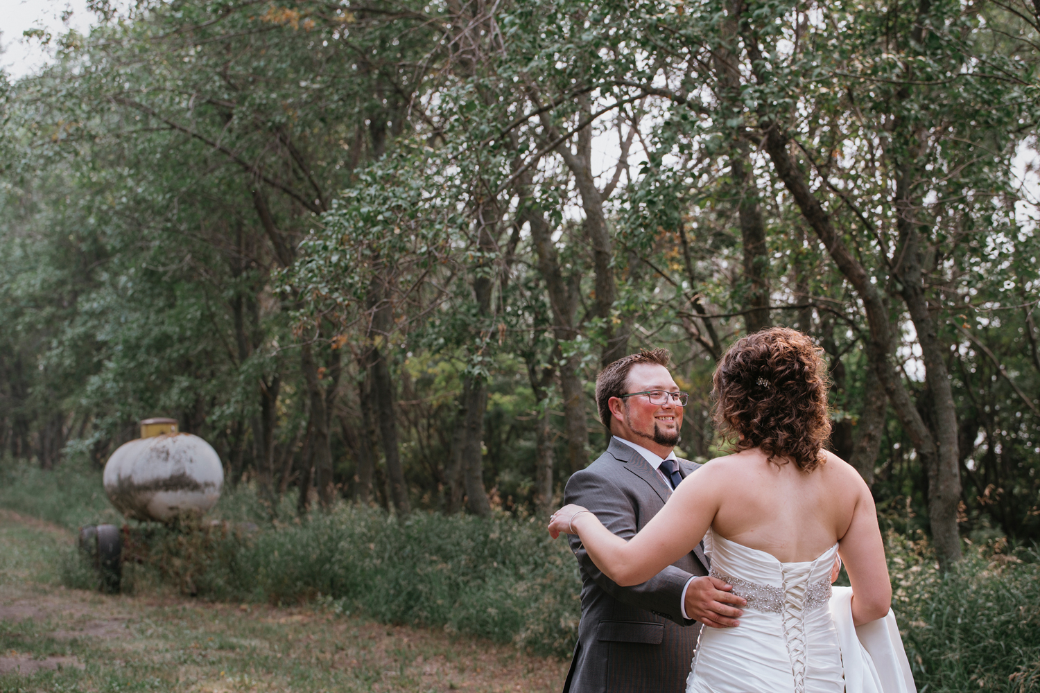 humboldt saskatchewan summer wedding bride and groom first look