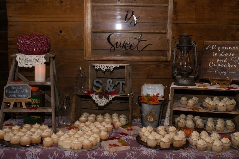 wedding dessert table at barn reception