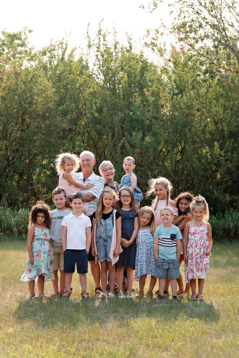 grandparents with all their grandkids