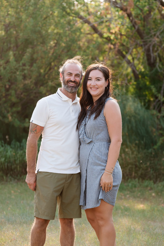 couples portrait of them laughing