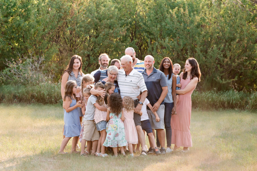 big extended family group hug