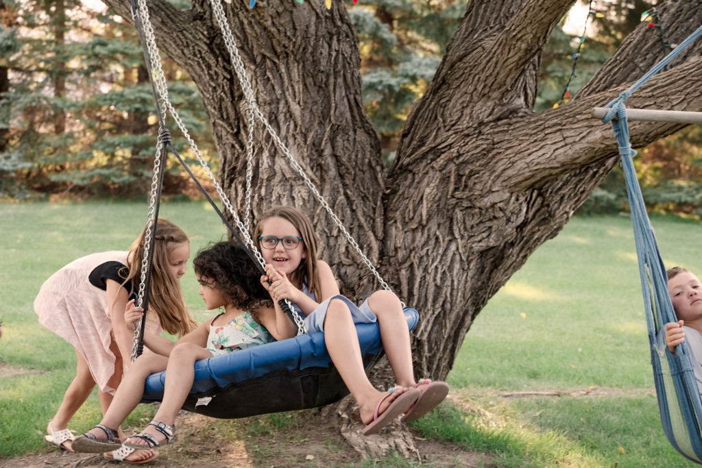 girls on a tree swing