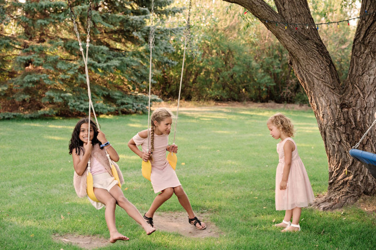 girls on a tree swing
