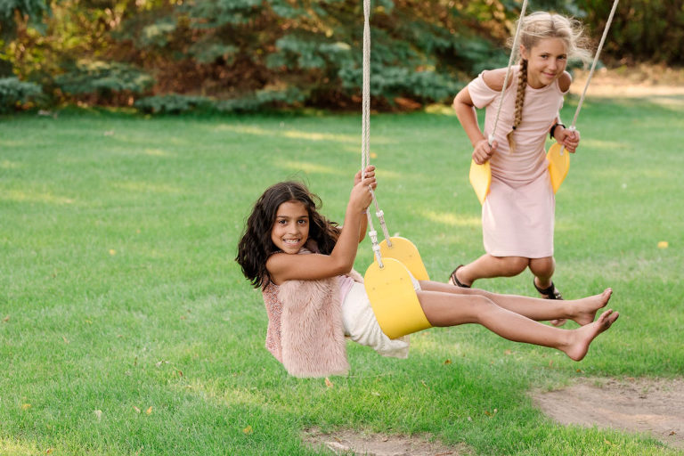 girls on a tree swing