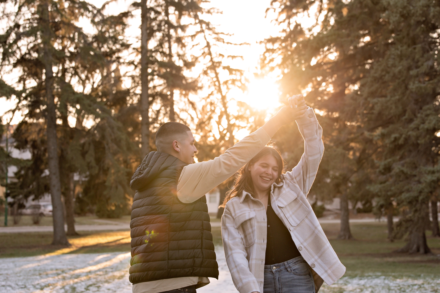 couple dancing in sunset light in late fall