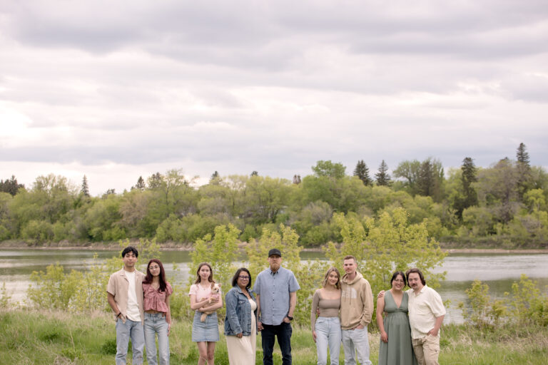 family session with saskatoon river in the background